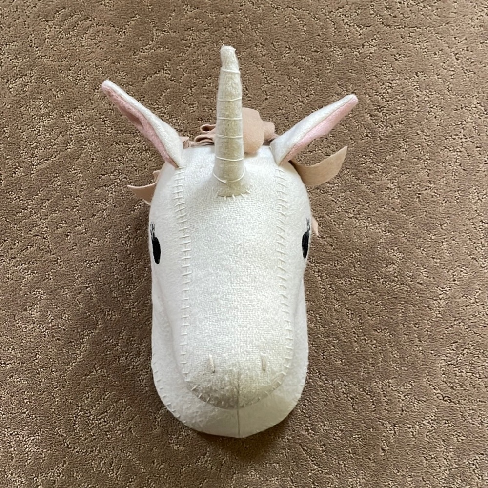 Unicorn head wall decor. Cream with pink and taupe accents